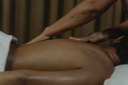 close up shot of a masseuse doing a massage