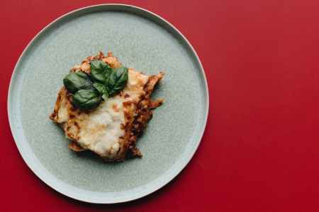 Cheesy lasagna dish on a plate