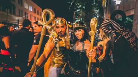 a couple wearing egyptian costumes
